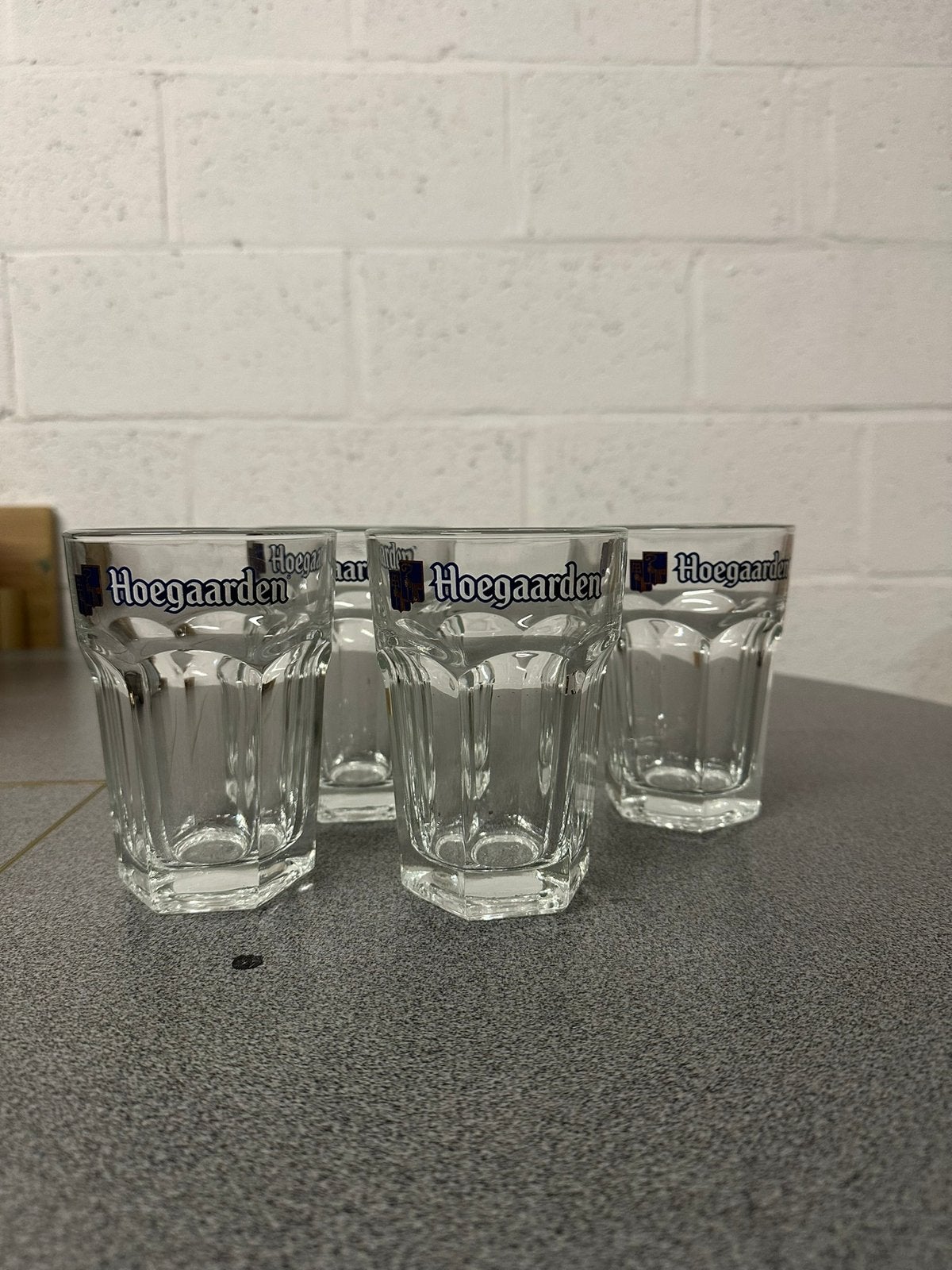 4 Hoegaarden glazen, Ophalen of Verzenden, Zo goed als nieuw