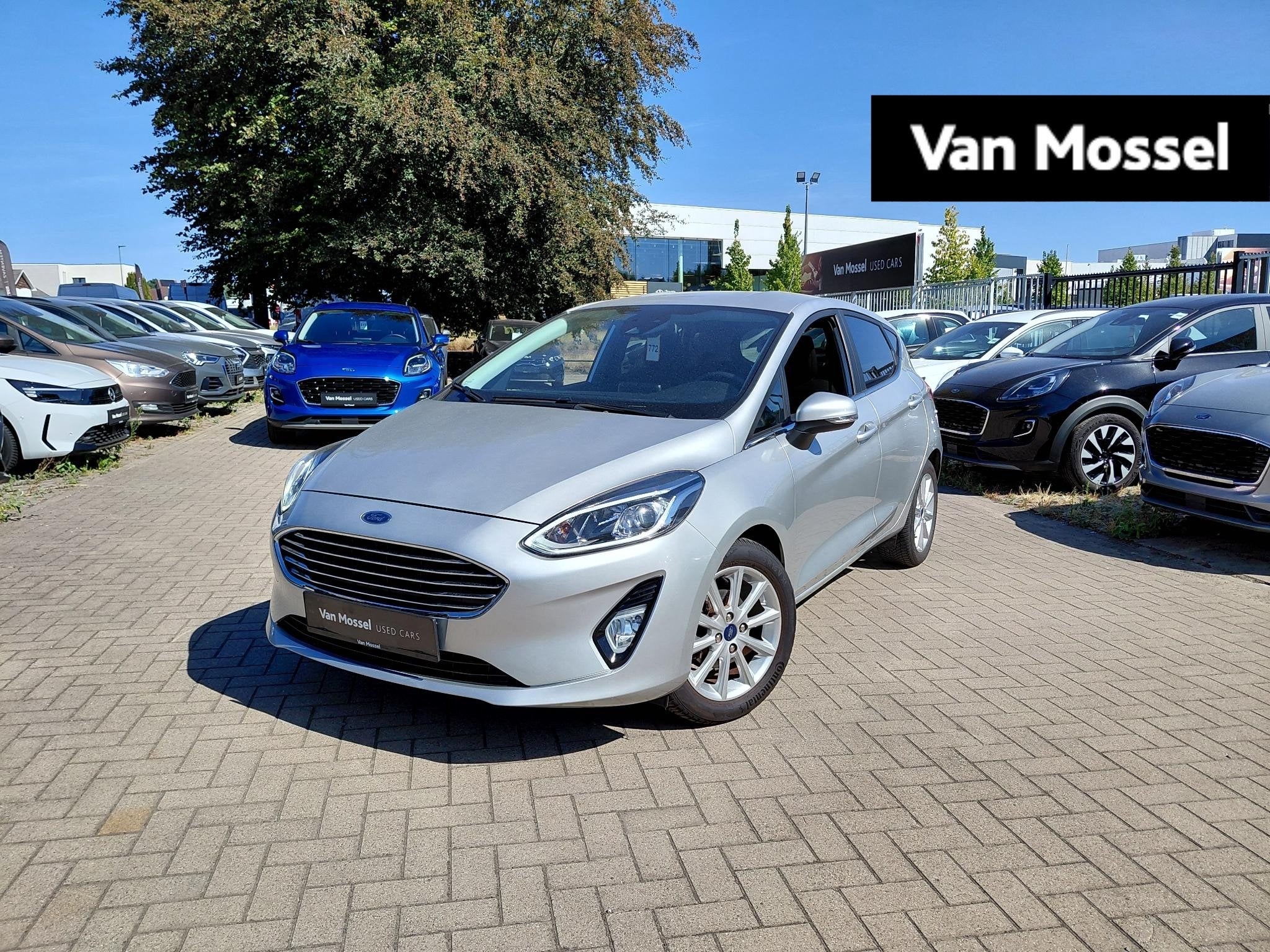 Ford Fiesta 1.1i 63kW Titanium, Auto's, Ford, Voorwielaandrijving, Stof, Automatische klimaatregeling, https://public.car-pass.be/vhr/b7b5220b-9bd7-4663-adda-66510f6b10d3