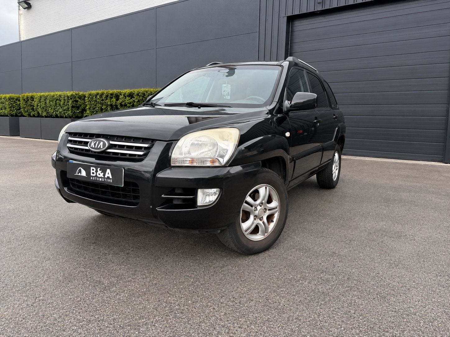 Kia Sportage 2.0 diesel automaat, Auto's, Gebruikt, Zwart, Zwart, Leder
