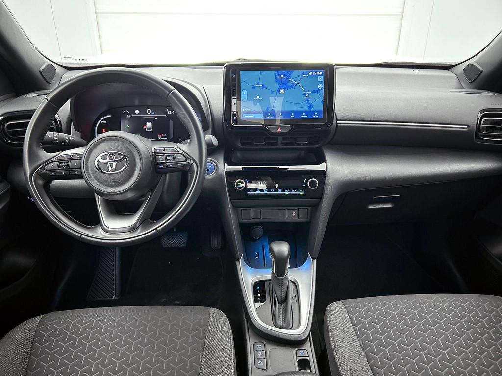 Toyota Yaris Cross 1.5 VVT-ie Hybrid 85kW Dynamic CVT | Acht, Auto's, Toyota, Stof, Gebruikt, 750 kg, Overige kleuren