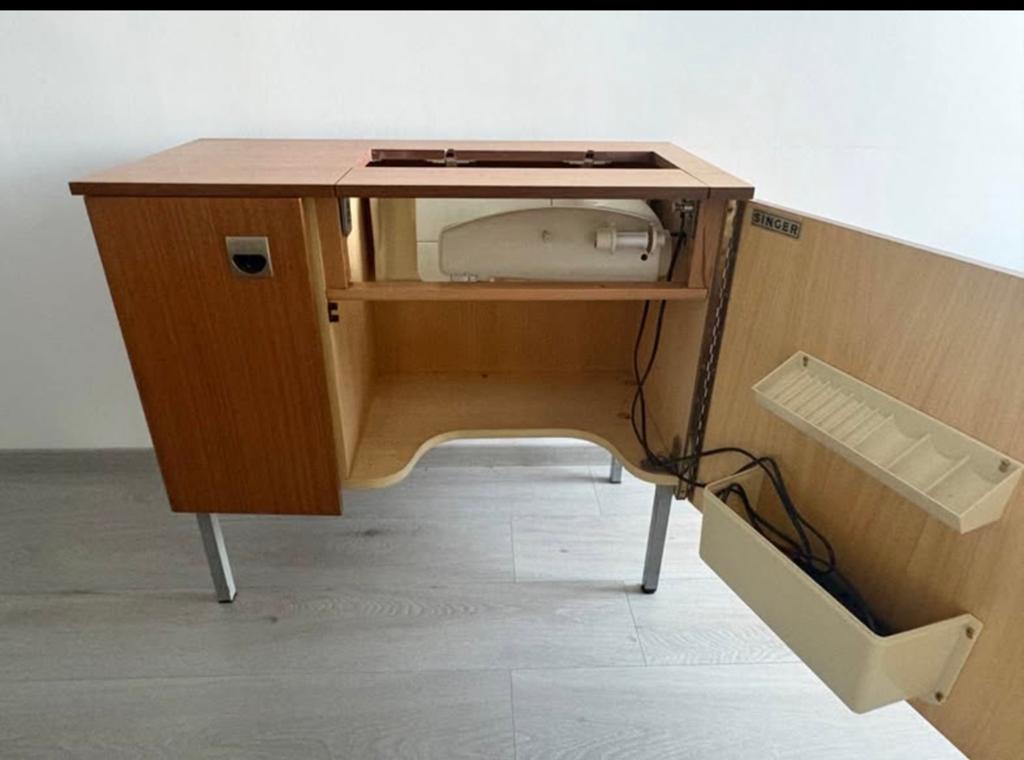 Machine coudre intégrée dans un meuble, Enlèvement
