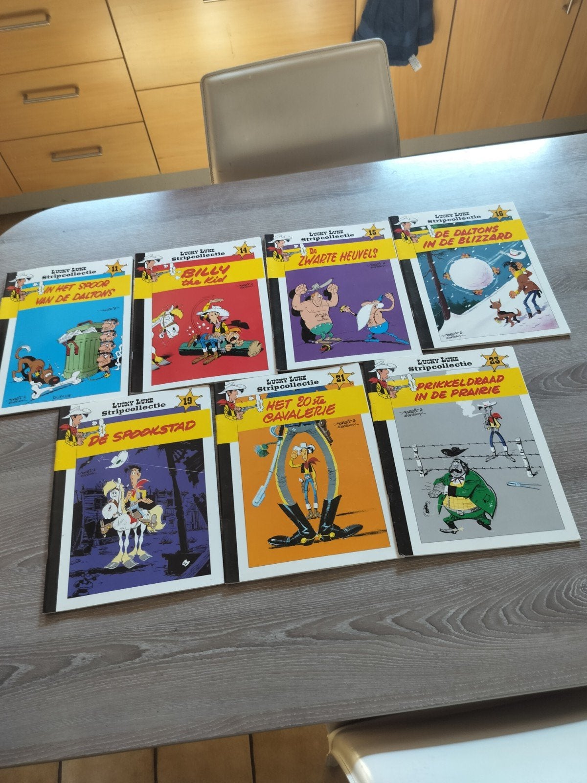 Zeven strips Lucky Luck uit de stripcollectie uitgave HLN SC, Ophalen of Verzenden