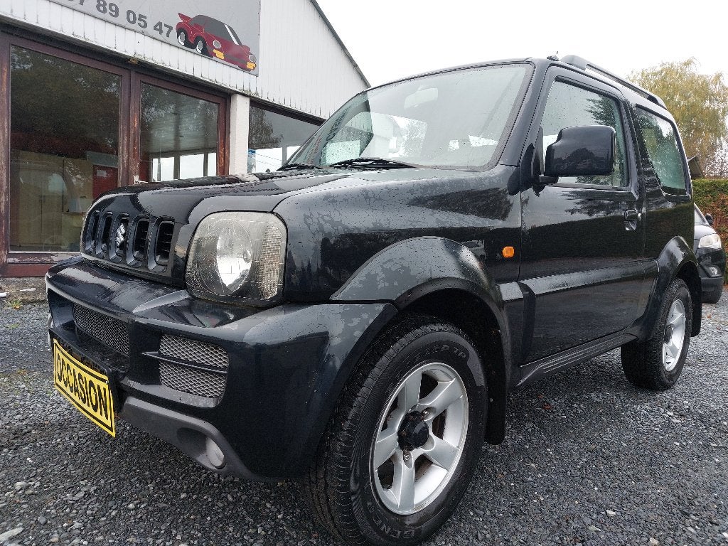 Suzuki Jimny 1.3i Utilitaire, Auto's, 4 cilinders, Zwart, Bedrijf, Handgeschakeld