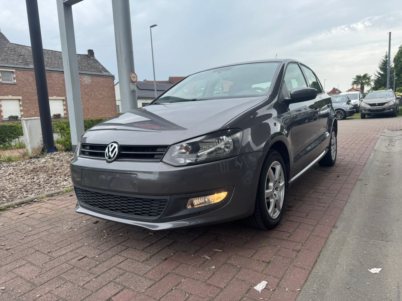 Volkswagen Polo 1.2 - BENZINE - AIRCO - 137.000km - 2013, Auto's, Stof, Zwart, Bruin, Bedrijf