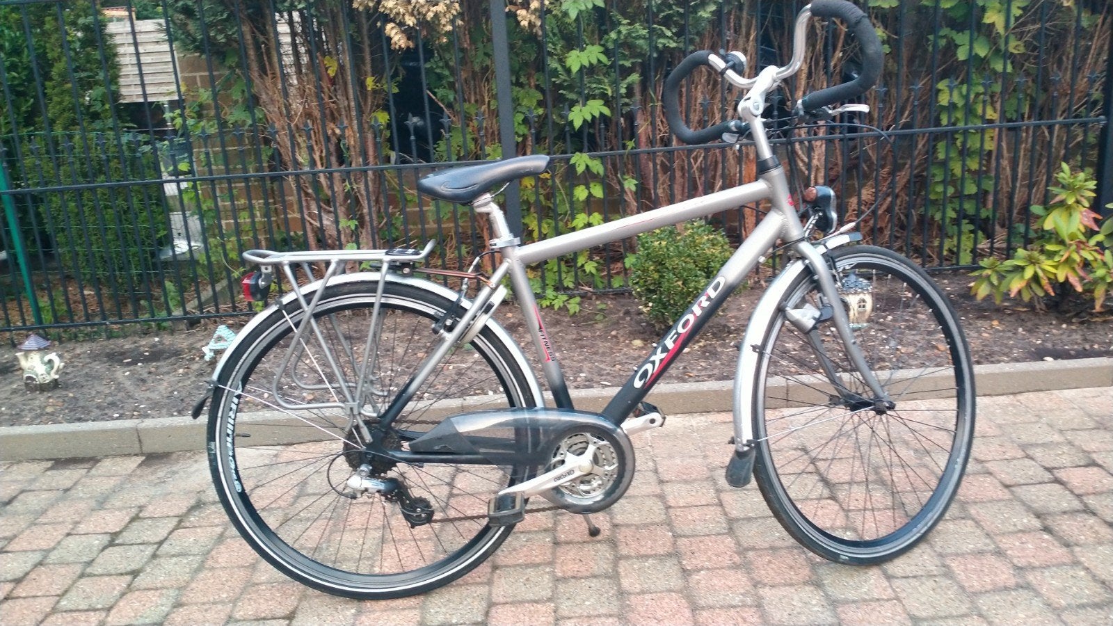 Sportieve herenfiets kotfiets, Ophalen
