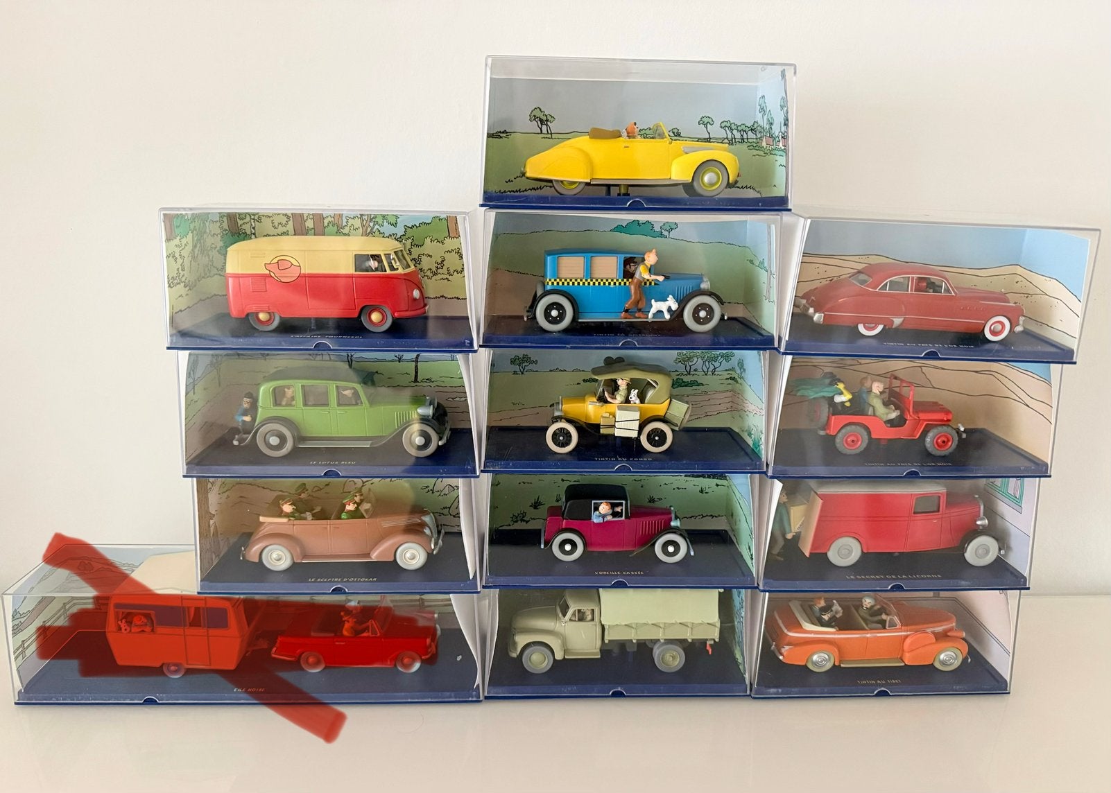 12 Moulinsart – Tintin / Kuifje voertuigen collectie, Hobby en Vrije tijd, Modelauto's | 1:43, Zo goed als nieuw, Auto, Overige merken