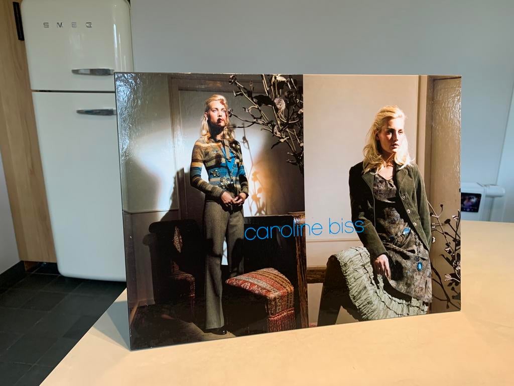 Vintage reclamebord Caroline Biss - winkeldisplay, Ophalen of Verzenden, Reclamebord