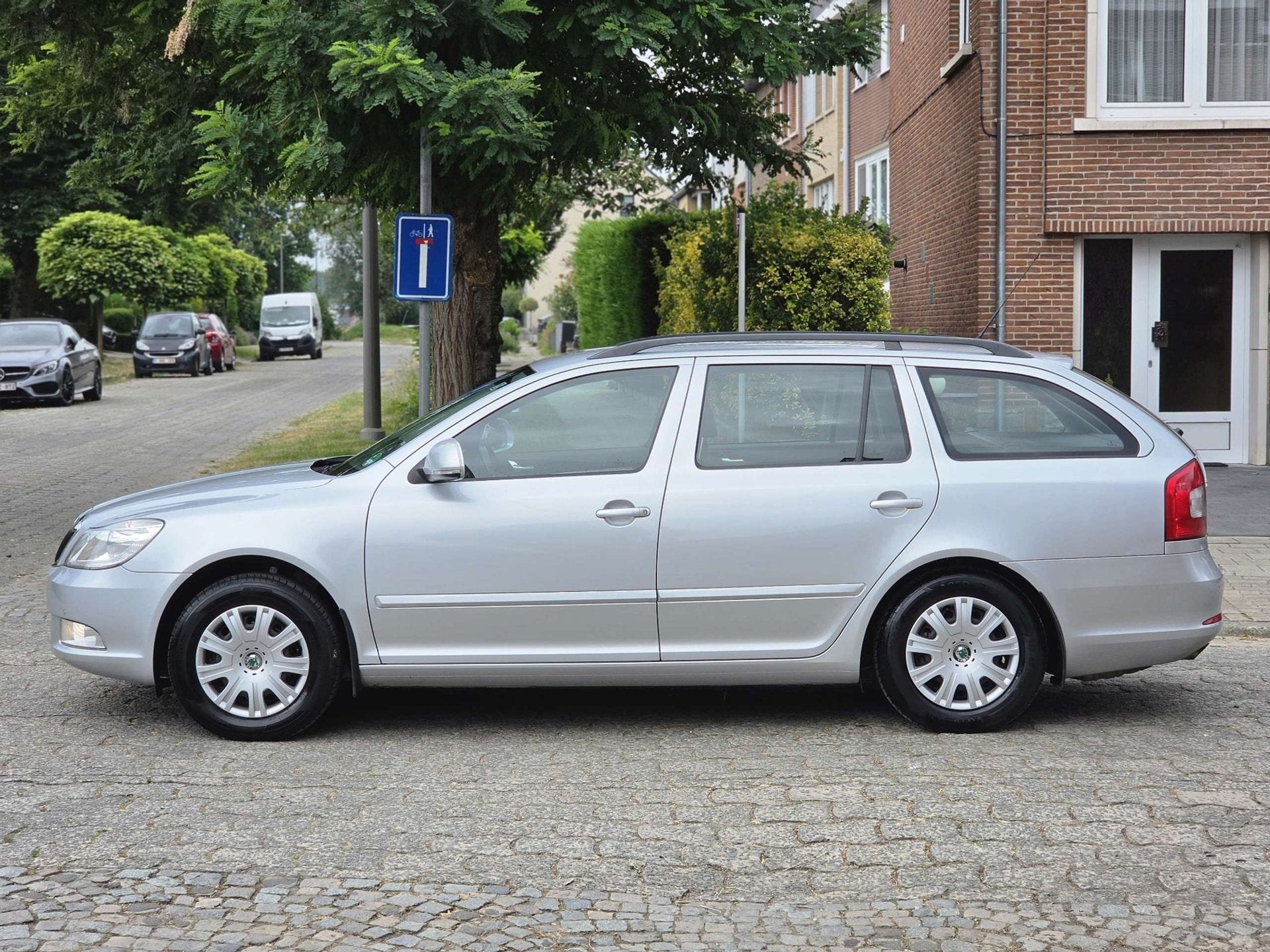 Skoda Octavia SW 1.4 TSI VOLLEDIGE ONDERHOUDSBOEKJE GEKEURD, Auto's, Skoda, 90 kW, Euro 5, Gebruikt, Zwart