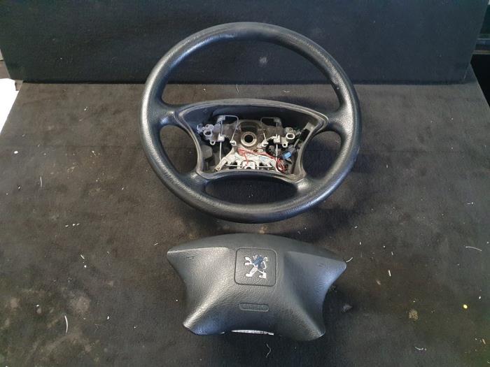 Volant d'un Peugeot Partner, -, 3 mois de garantie, Utilisé, -