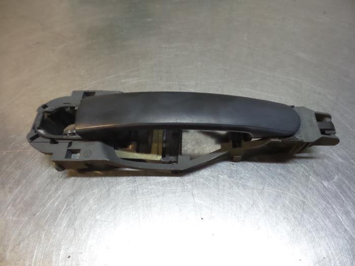 Portiergreep 2Deurs links van een Volkswagen Fox (Fox 05-), Auto-onderdelen, Carrosserie, Volkswagen, Gebruikt, 3 maanden garantie