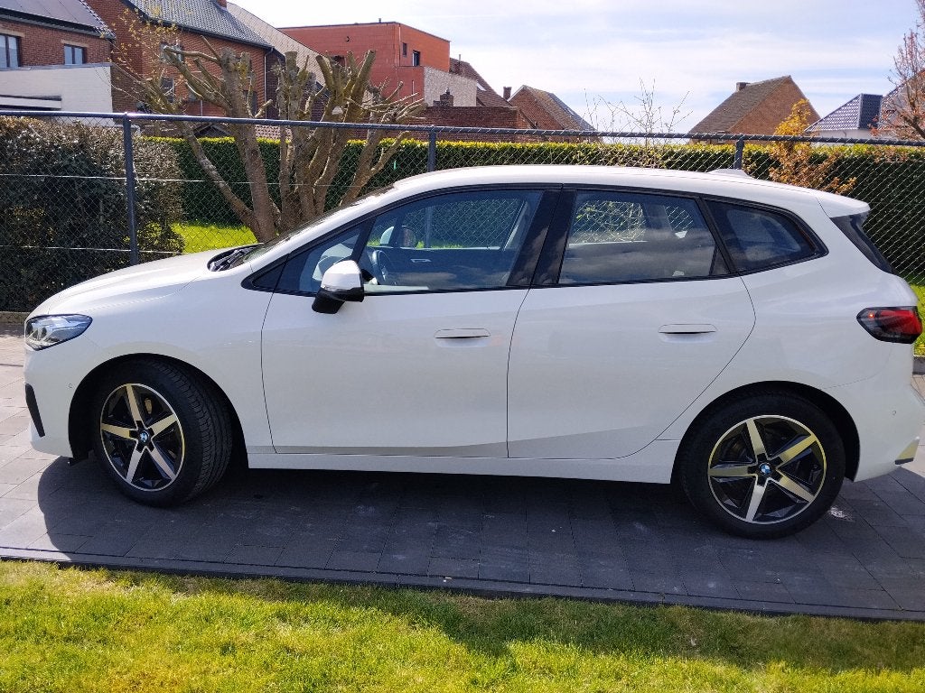 BMW 218i Active Tourer | 2 Jaar Gar. | Carpas | Nieuwstaat, Auto's, Wit, 2 Reeks Active Tourer, Particulier, Dealer onderhouden