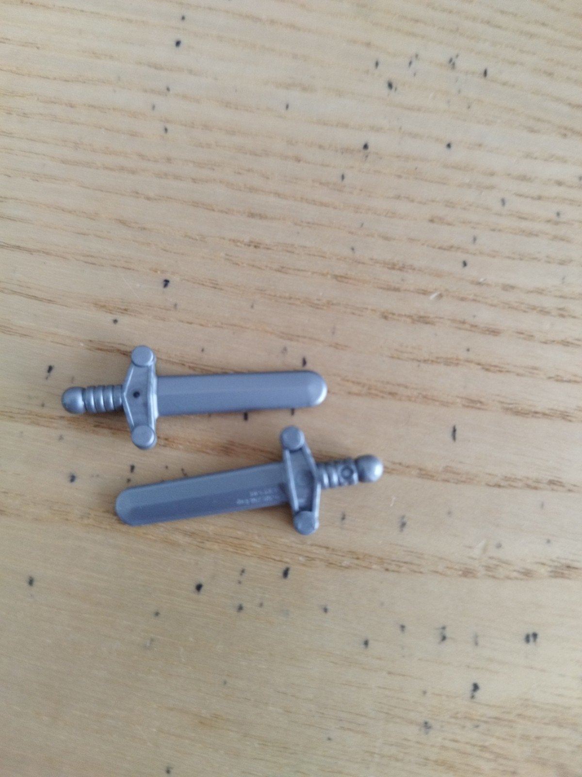 2 zilver grijze kleurige lego zwaarden, Ophalen of Verzenden, Lego