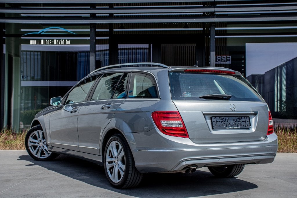 Mercedes-Benz C200 CDI Avantgarde / AIRCO / SENSOREN / GPS, Auto's, Mercedes-Benz, 100 kW, Euro 5, Zwart, 4 cilinders