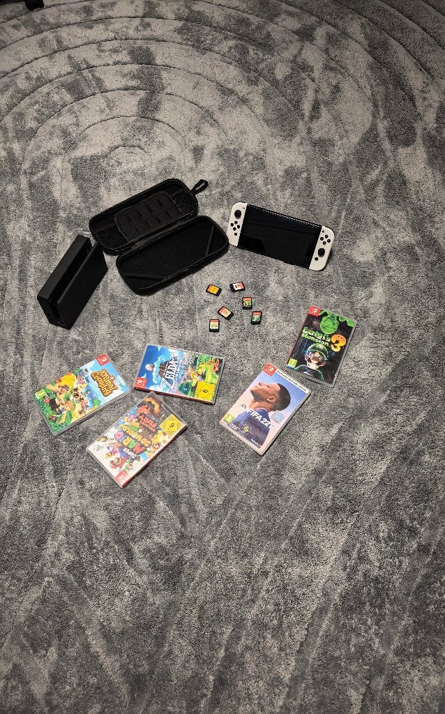 Switch oled wit +alle toebehorene (games apart te krijgen), Ophalen of Verzenden, Zo goed als nieuw, Met 1 controller, Switch OLED