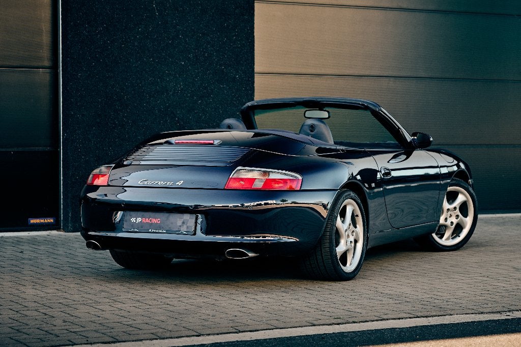 Porsche 996 Carrera 4 cabrio tiptronic 3,6 (320Pk), Auto's, Xenon verlichting, Cabriolet, Blauw, Leder
