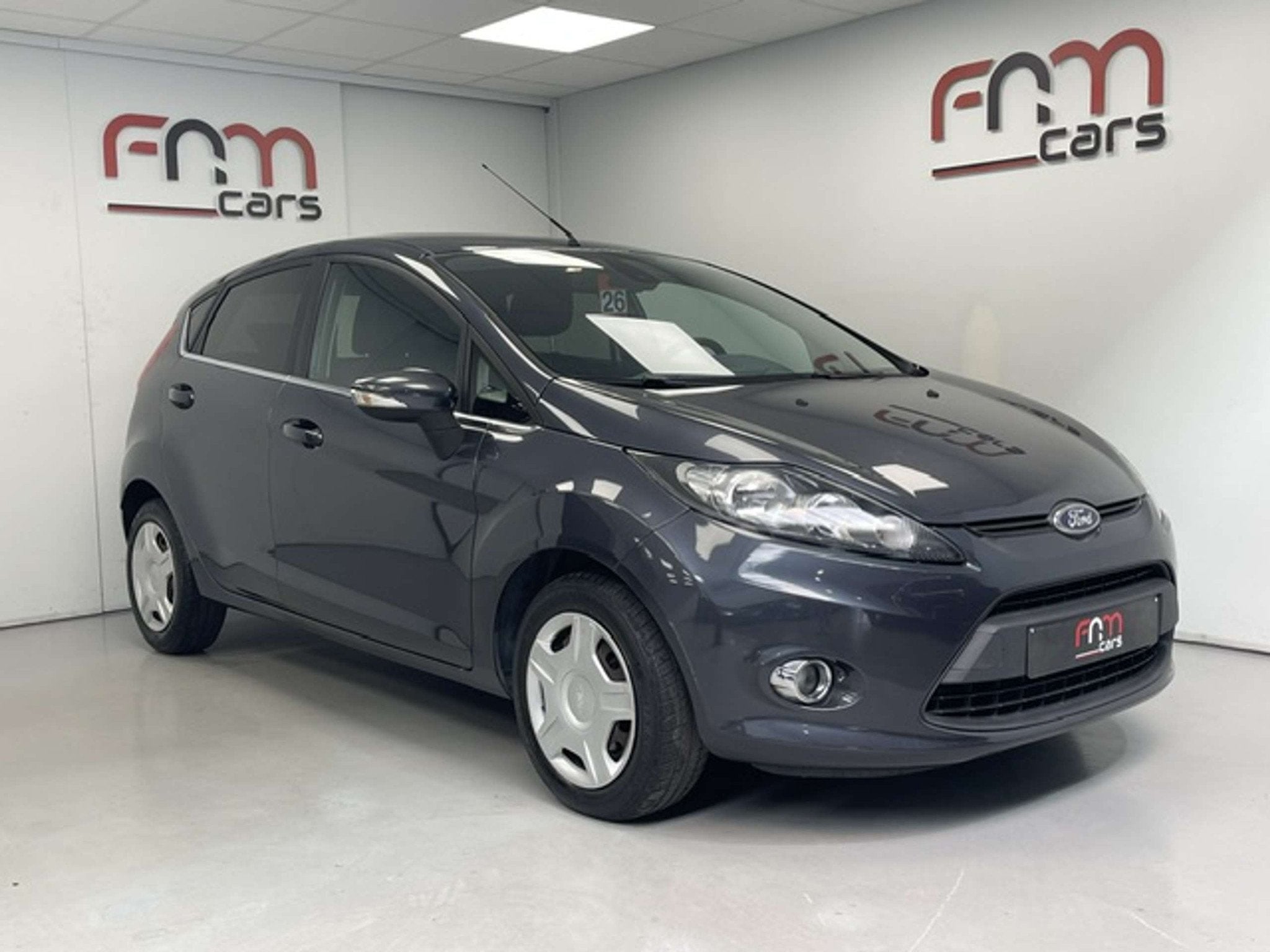 Ford Fiesta 1.4i benzine bwj2010 Airco Pdc Garantie, Auto's, Gebruikt, Zwart, 4 cilinders, Bedrijf