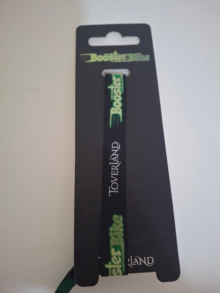Arembandje Toverland boosterbike., Ophalen