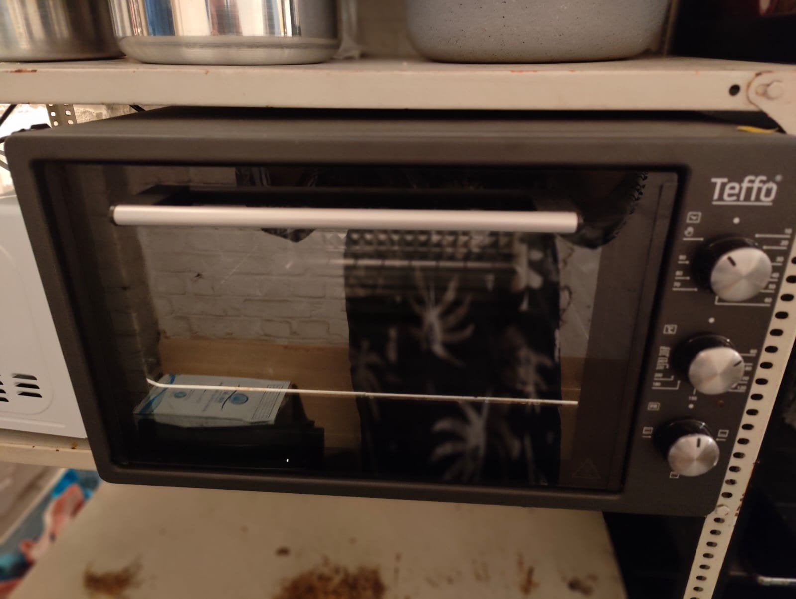 Teffo oven, Ophalen, Oven