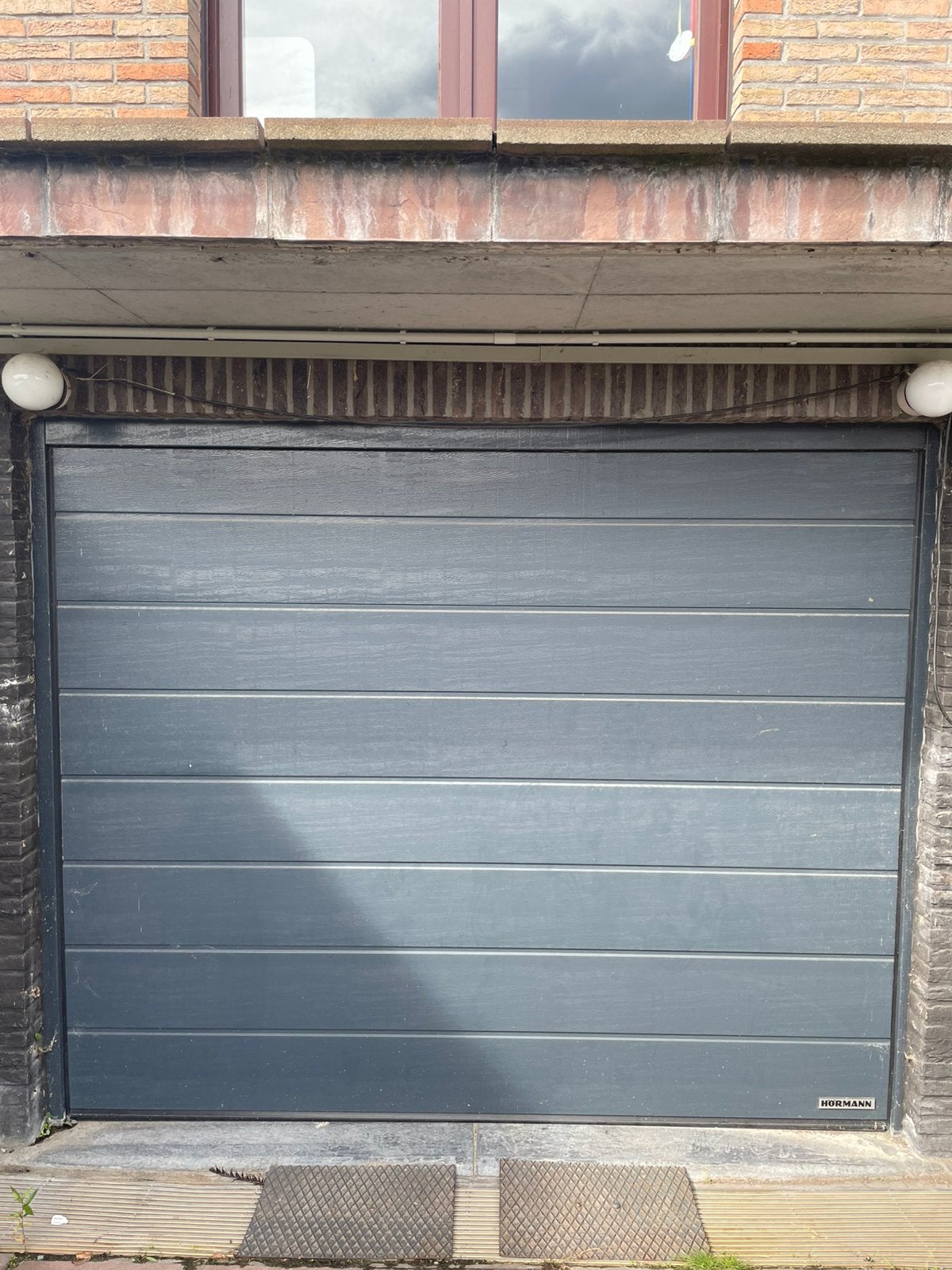 Sectionale poort Hörmann inclusief motor, Ophalen