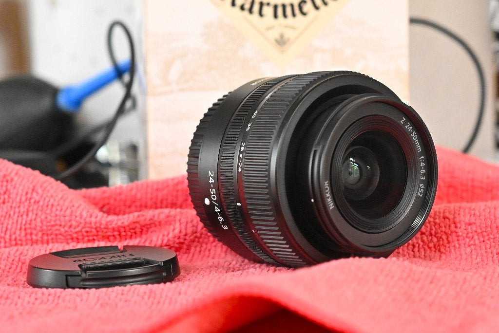 nikon  24-50, TV, Hi-fi & Vidéo, Enlèvement ou Envoi, Comme neuf, Appareil photo hybride, Nikon