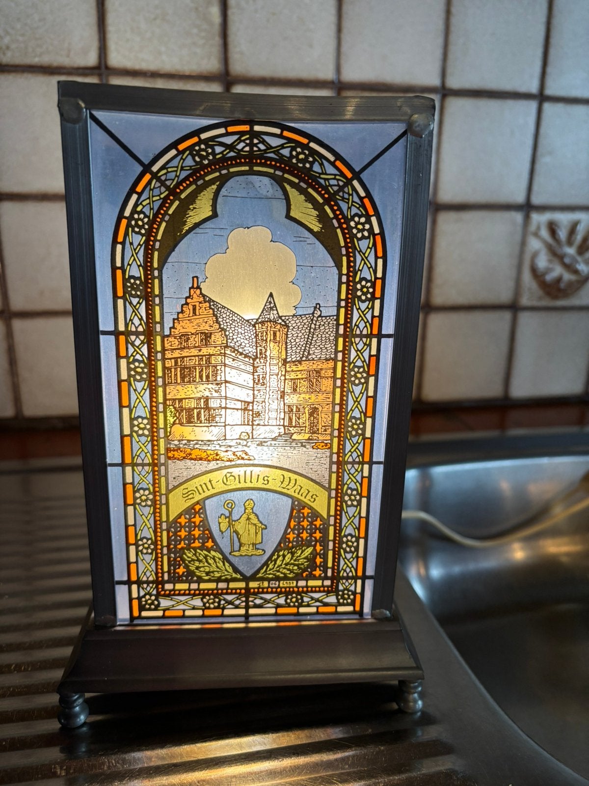 Tinnen lamp, Enlèvement