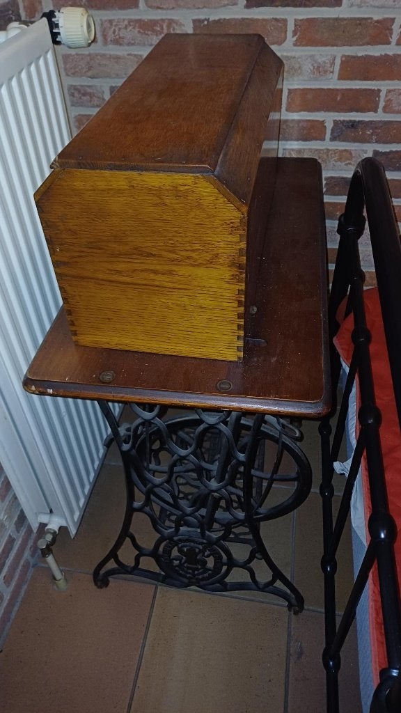 oude Singer naaimachine, Ophalen