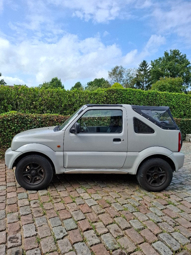 Suzuki Jimny Cabrio 1.3 4x4, Auto's, 4 zetels, Stof, 4 cilinders, Cabriolet