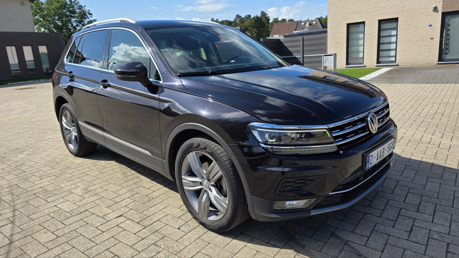 VW Tiguan 1.4 Benzine Automaat  !!, Auto's, 4 cilinders, Zwart, Leder, Parkeerassistent