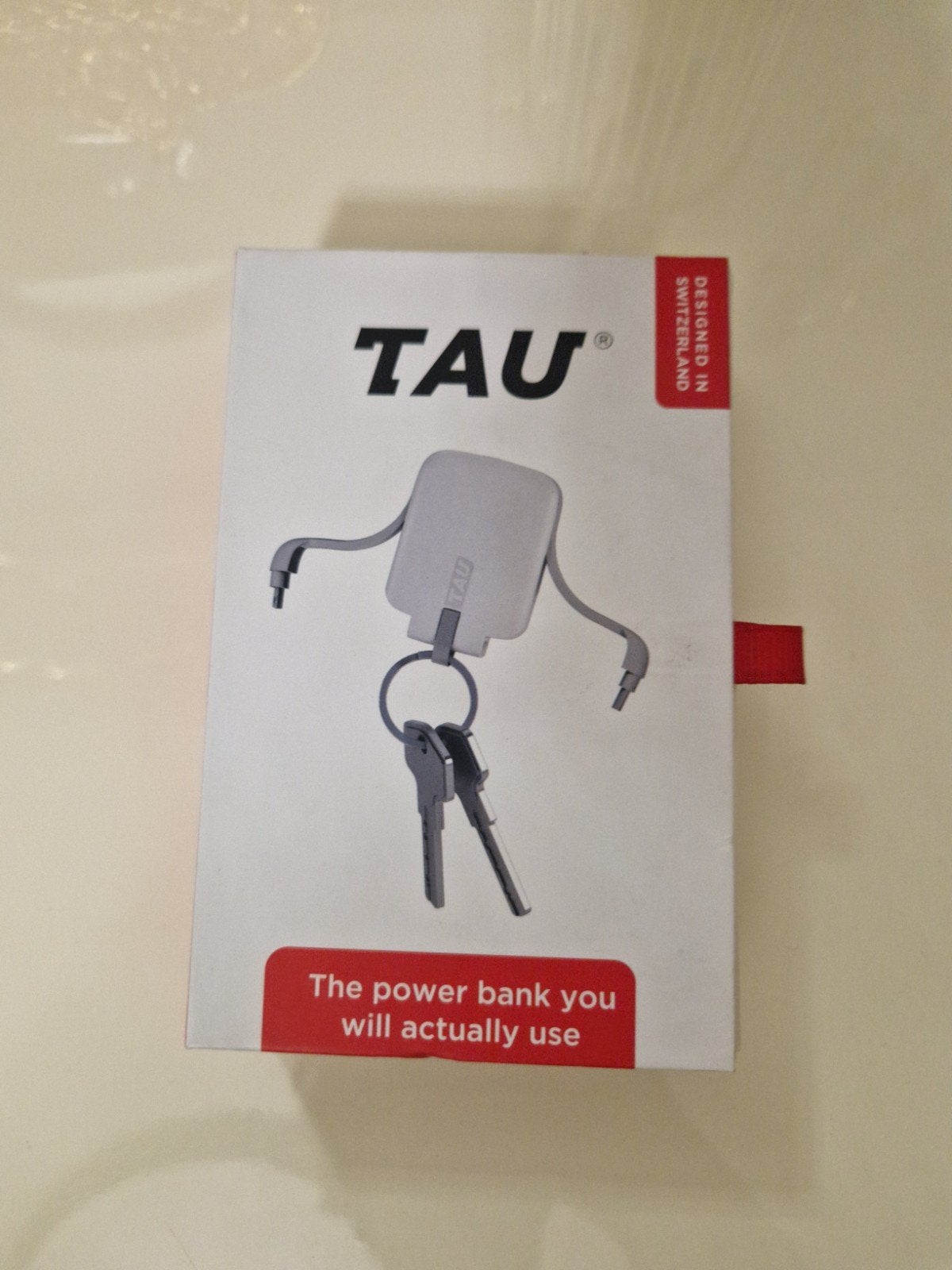 Tau oplaader plus sleutels hanger, Telecommunicatie, Telefoonhouders, Ophalen of Verzenden