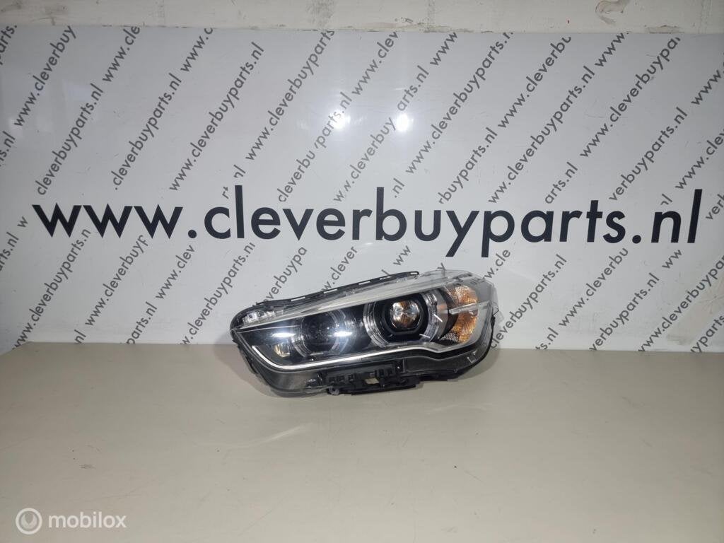Koplamp links origineel xenon BMW X1 F48 (15-19) 7472219-01, Gebruikt, Ophalen of Verzenden, BMW, BMW