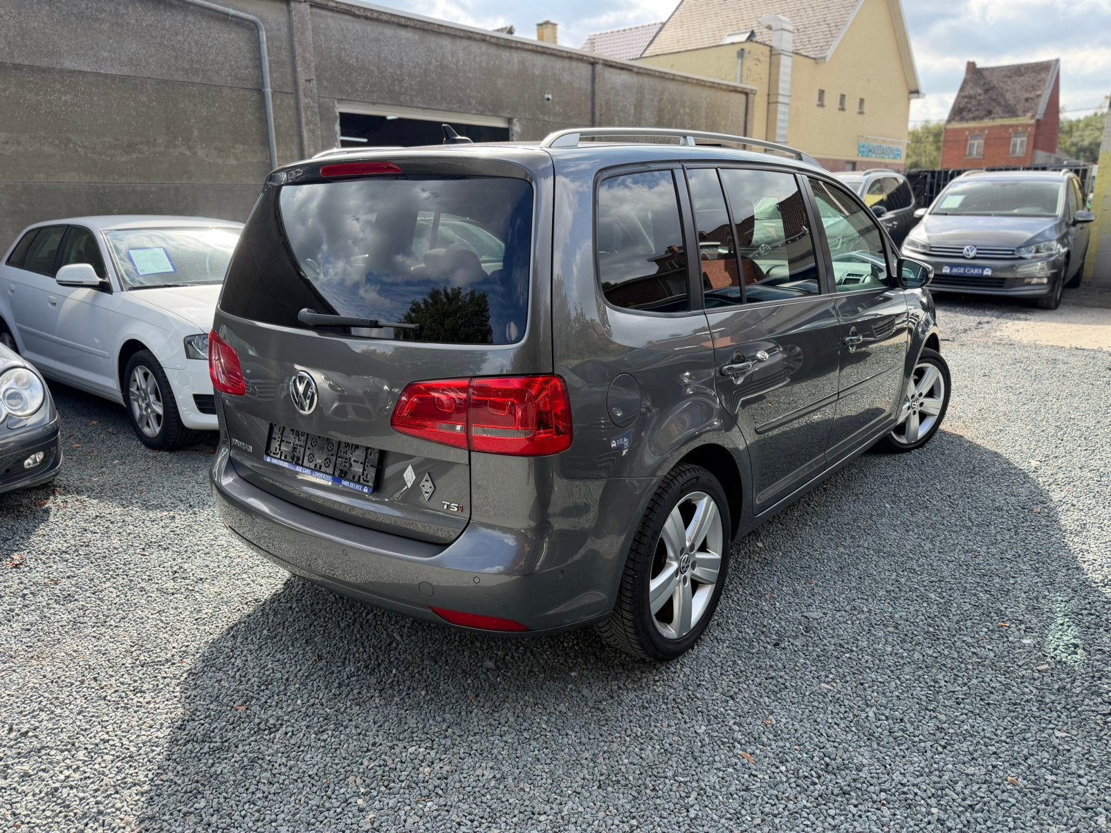 Volkswagen Touran 1.4 TSI 7-zits automaat, Auto's, Automaat, Euro 5, Zwart, 4 cilinders