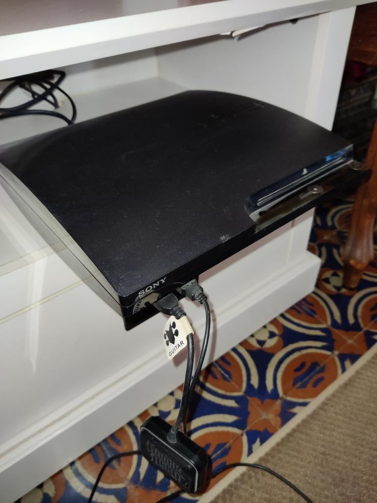 Console PS3 + jeux + guitare hero avec capteur + mannette, Enlèvement, Slim