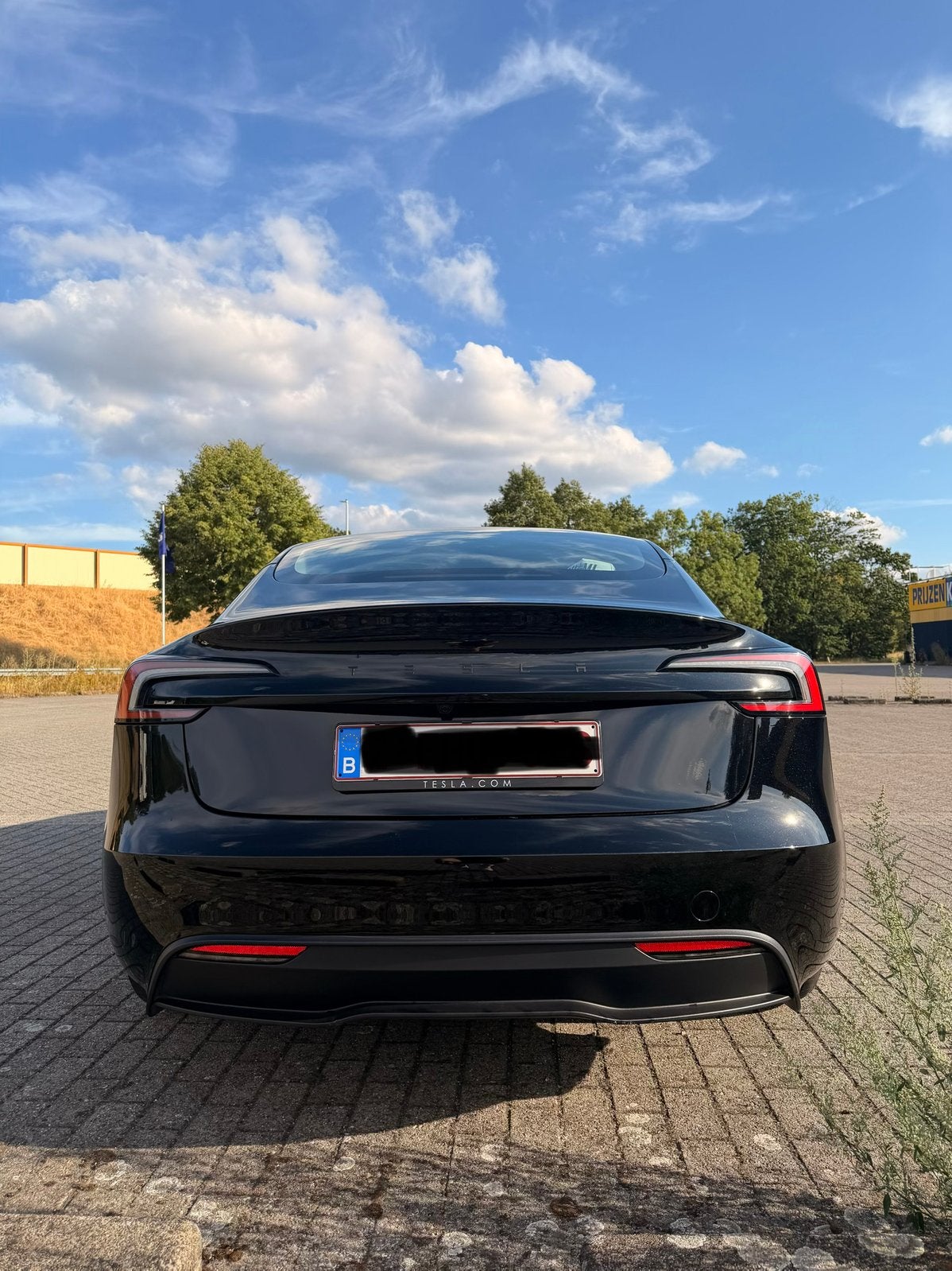 Tesla Model 3 Long Range RWD – 2025 – Full Option – 20.000km, Auto's, Tesla, Automaat, Achterwielaandrijving, Parkeersensor, Zwart
