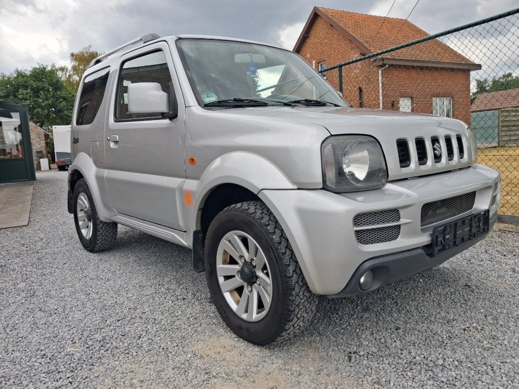suzuki jimny #bj 2011# 1300cc benzine !!airco gps!! gekeurd, Autos, Cuir, Argent ou Gris, Achat, Entreprise