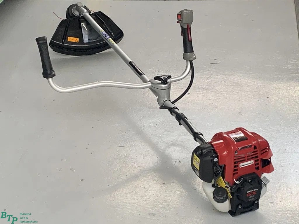 Honda bosmaaier actie Nieuw! 4 takt incl. harnas en mes, Faucheuse