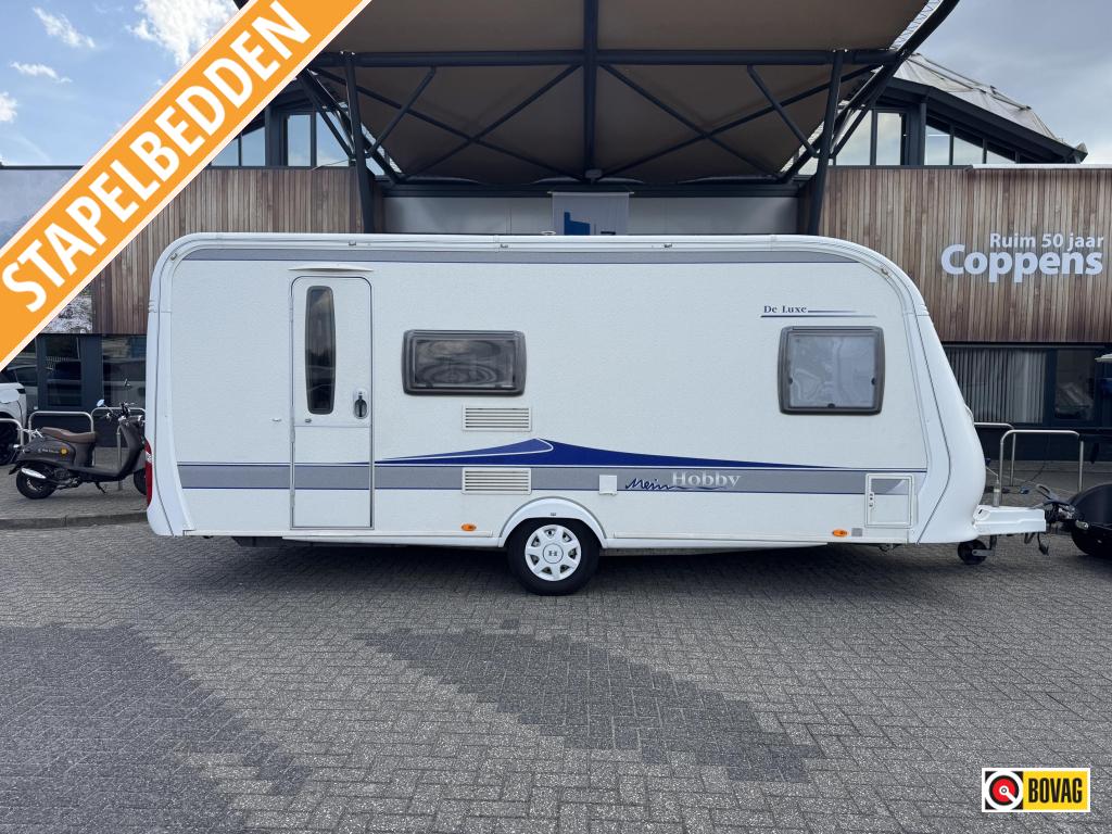 Hobby De Luxe 500 KMFE 2009 NIEUWE 270 TENT!, Schokbreker, Treinzit, 5 tot 6 meter, Tot en met 6