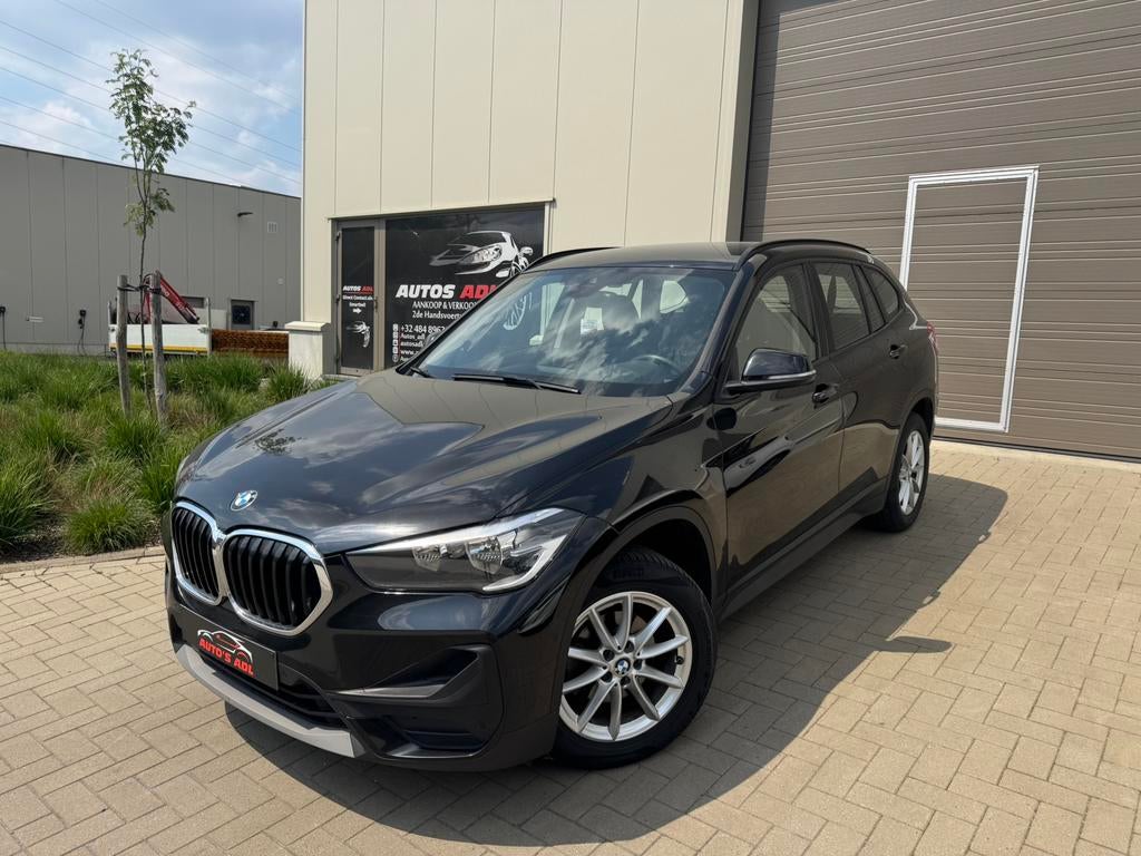 Bmw X1 1.5dA/AUTOMAAT/LEDER/TREKHAAK/OHB/GARANTIE, 109 g/km, Zwart, Leder, Bedrijf