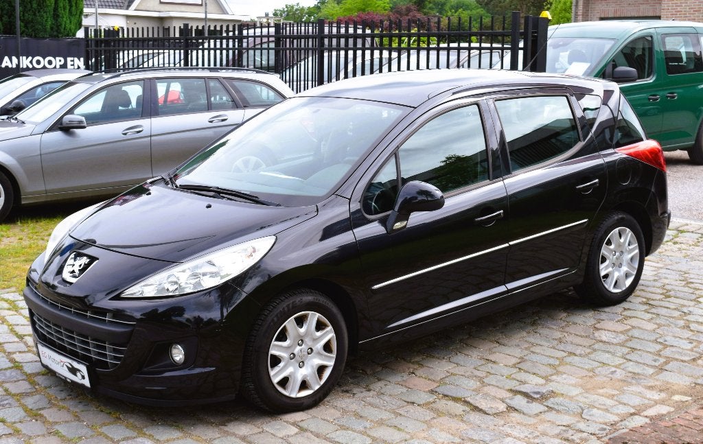 Peugeot 207 SW 1.4i/PANO/AIRCO/HISTORY/GARANTIE, Auto's, Voorwielaandrijving, Euro 5, Stof, Zwart