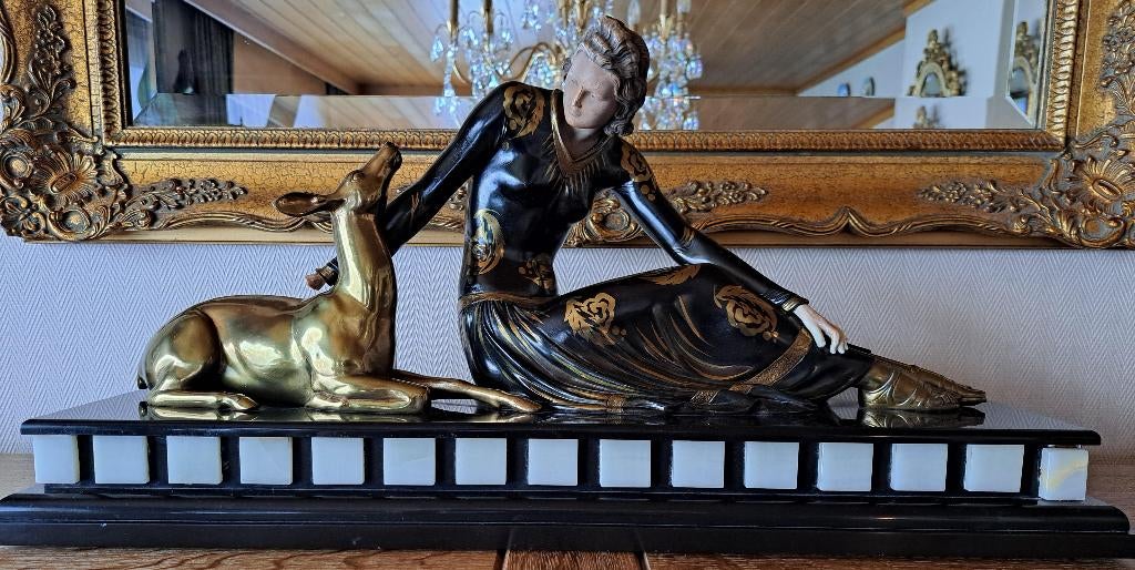 art deco beeld, Ophalen