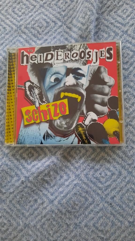 DE HEIDEROOSJES Schizo (cd), CD & DVD, CD | Rock, Enlèvement ou Envoi, Comme neuf, Autres genres