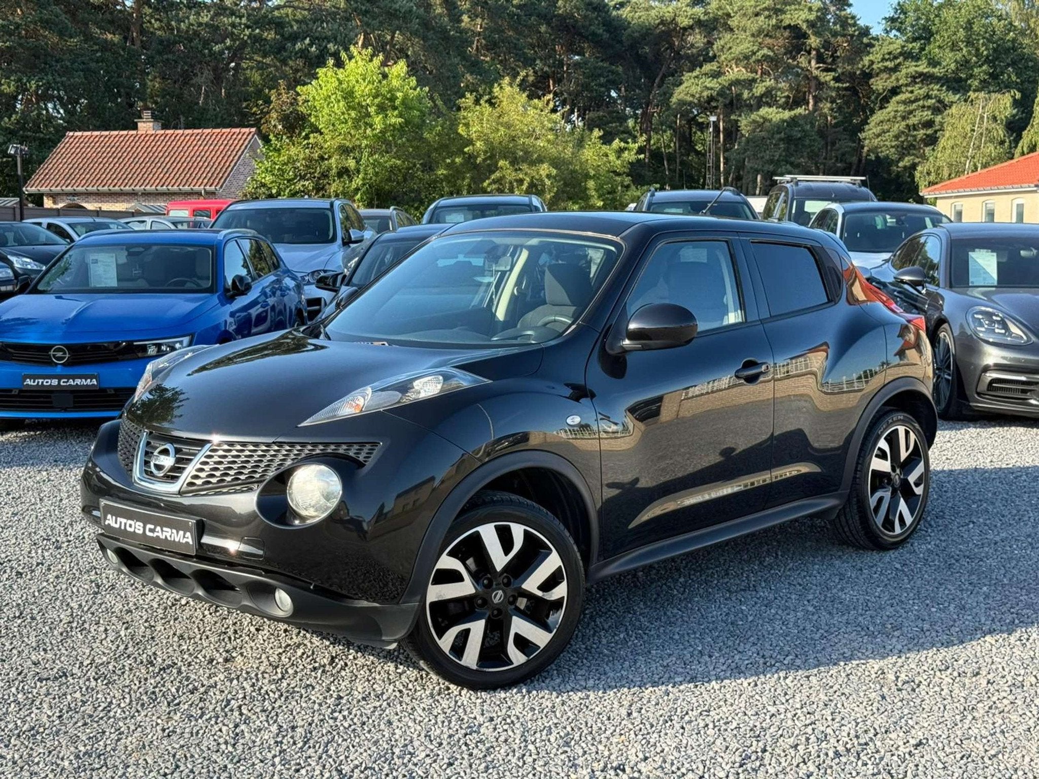Nissan Juke Airco Diesel Zuinig Achtercamera manueel, Auto's, Euro 5, Stof, Gebruikt, Zwart