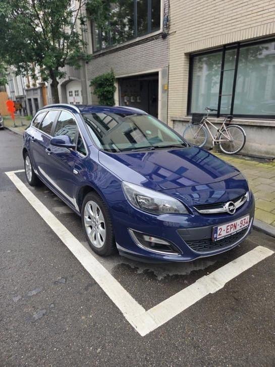 Opel Astra J 1.6 Sports Tourer Automat (2013), Zwart, 4 cilinders, Blauw, Navigatiesysteem