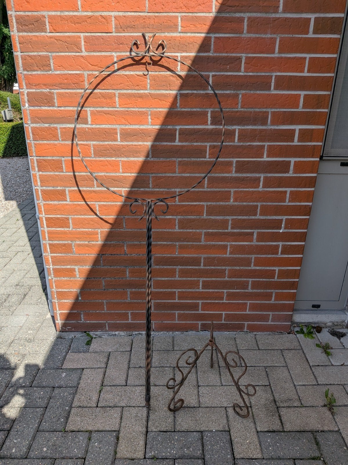 smeedijzeren standaard voor een vogelkooi, Ophalen