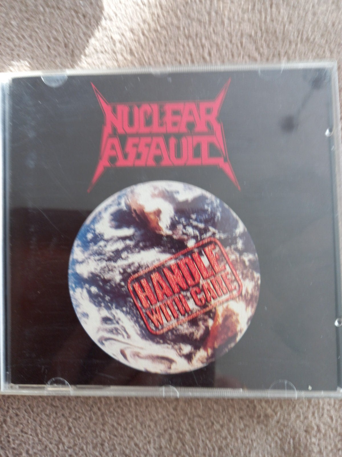 Nuclear assault   handle with care, Ophalen of Verzenden