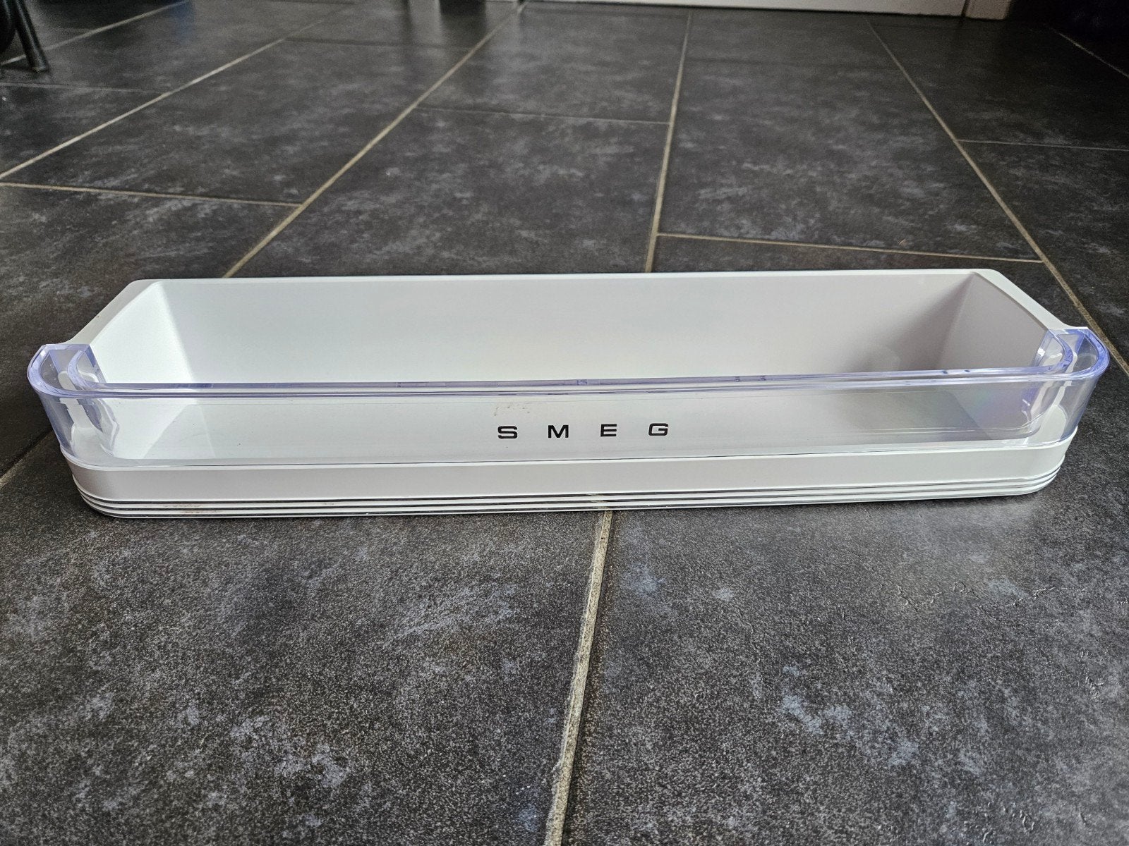 Smeg frigo botervak deur, Ophalen