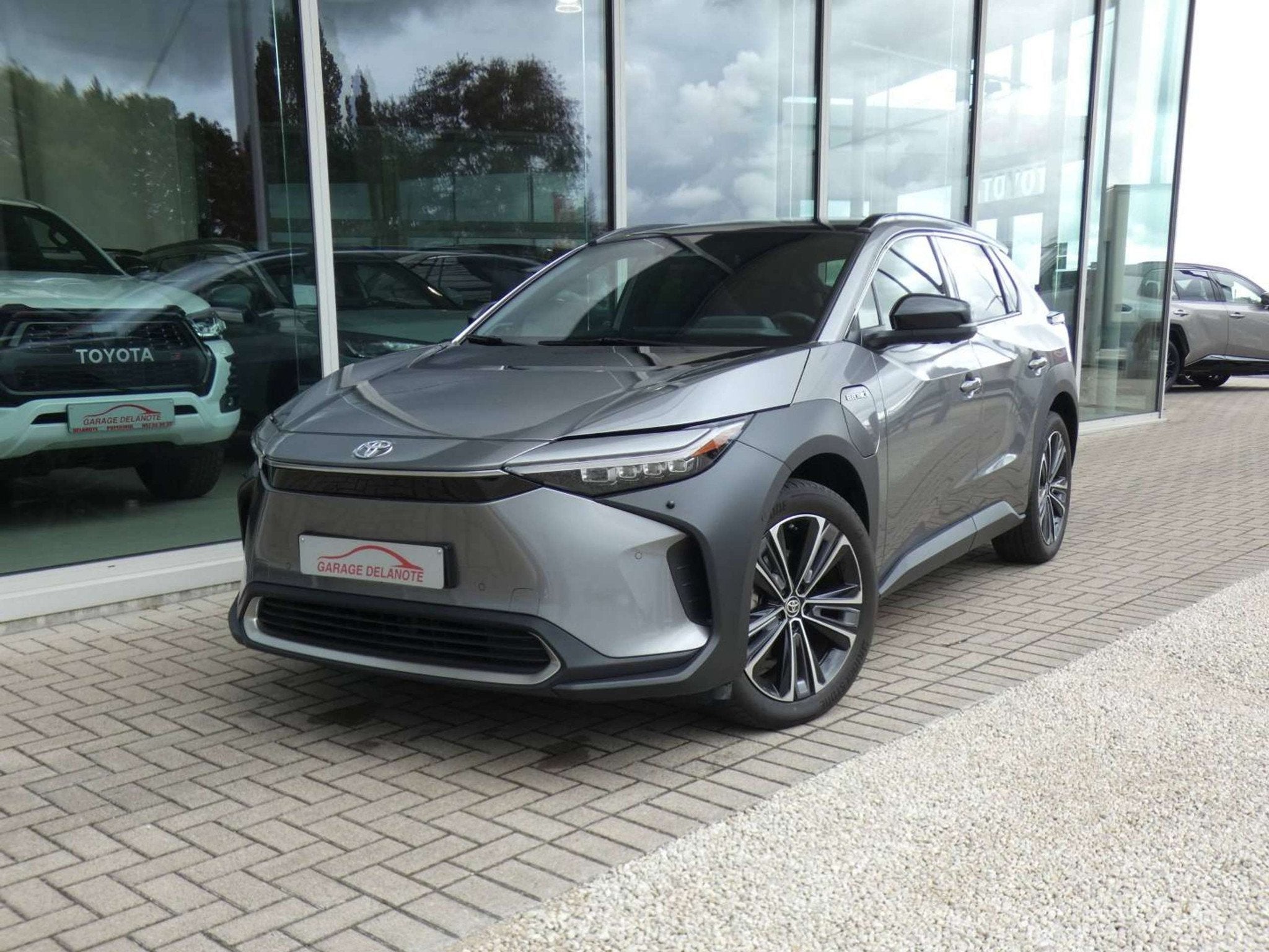 Toyota Bz4x |SOH 98,2%| AWD PREMIUM +Trekhaak +Pano dak +LED, Cuir, Achat, Noir, 5 portes