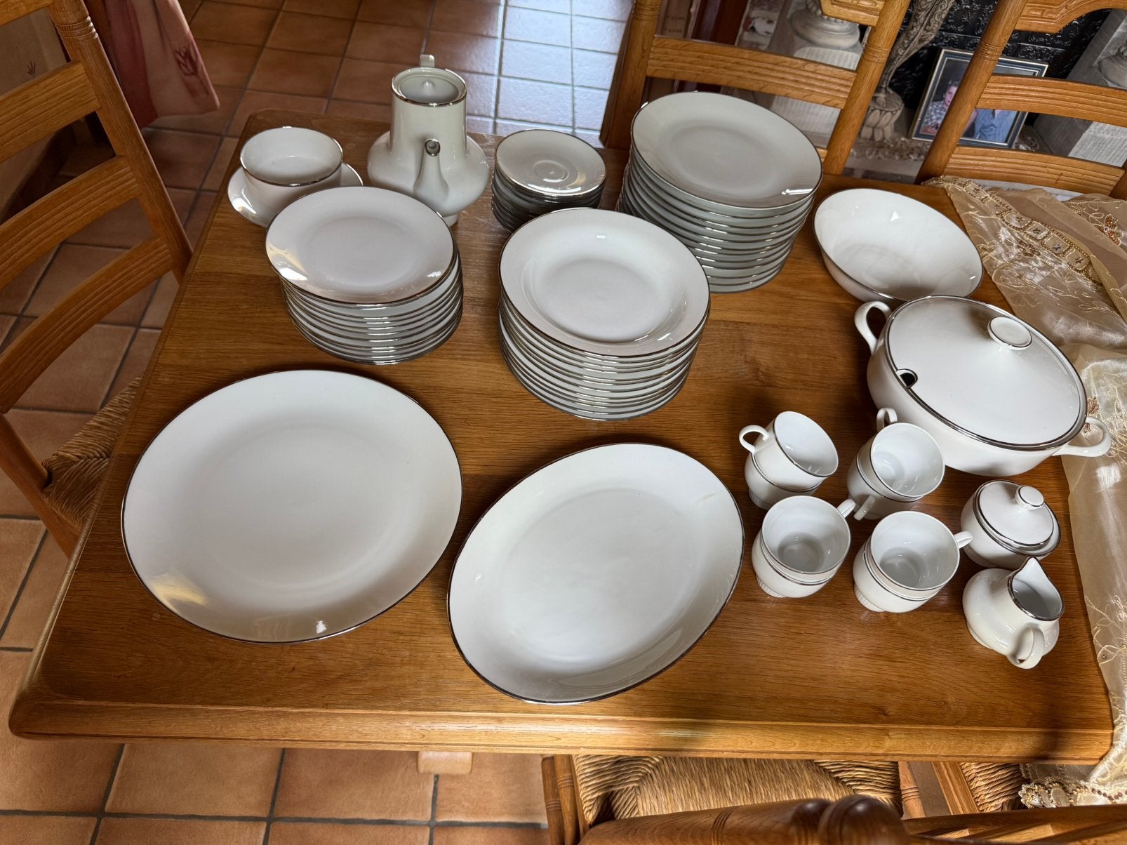 Porseleinen servies (belgisch), Ophalen
