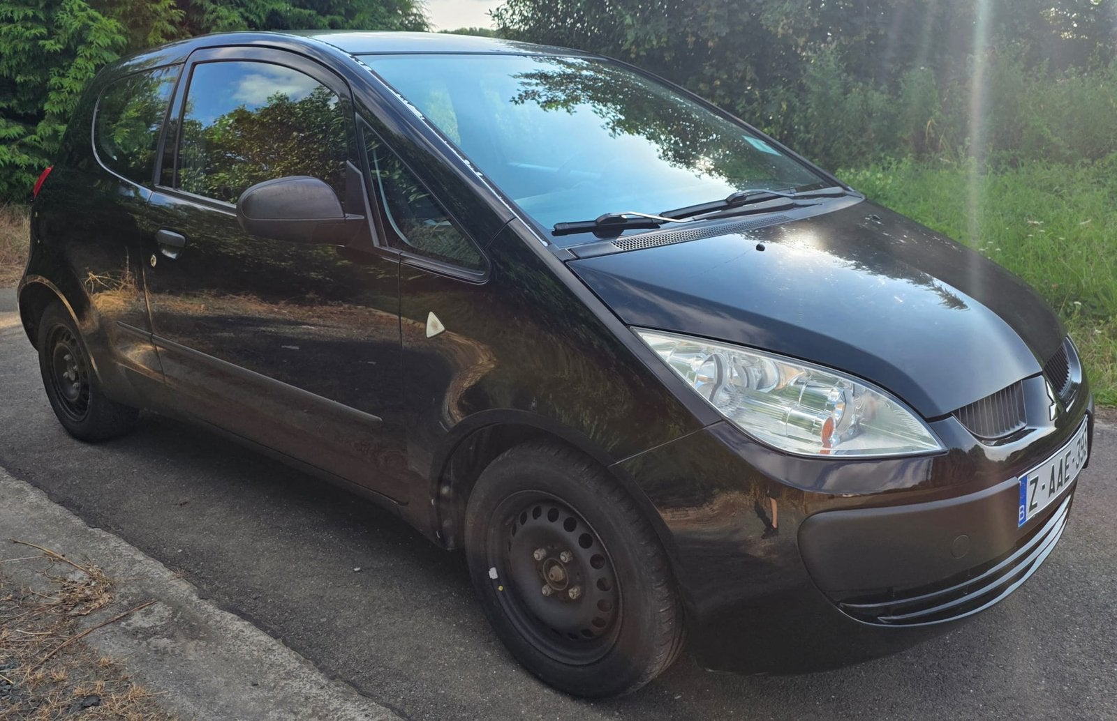 Mitsubishi Colt 1.1 benzine, Voorwielaandrijving, Zwart, Airbags, Bedrijf