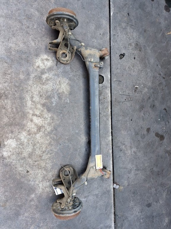 ACHTERAS VWA ABS Nissan Pixo (D31S) (|430104A00C|), Gebruikt, Germany@nissan-services.eu, Kronenweg 38
50389  Wesseling, DE, Nissan