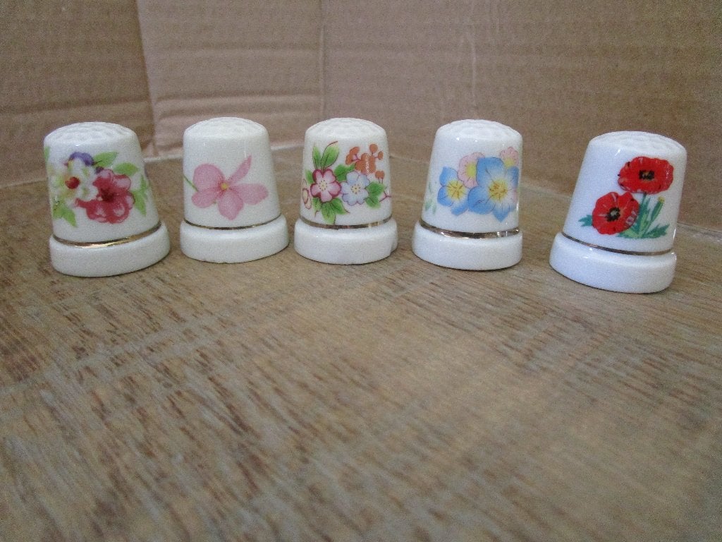 5 Vingerhoedjes bloemen ( Yves Rocher ), Verzamelen, Ophalen of Verzenden, Nieuw, Porselein